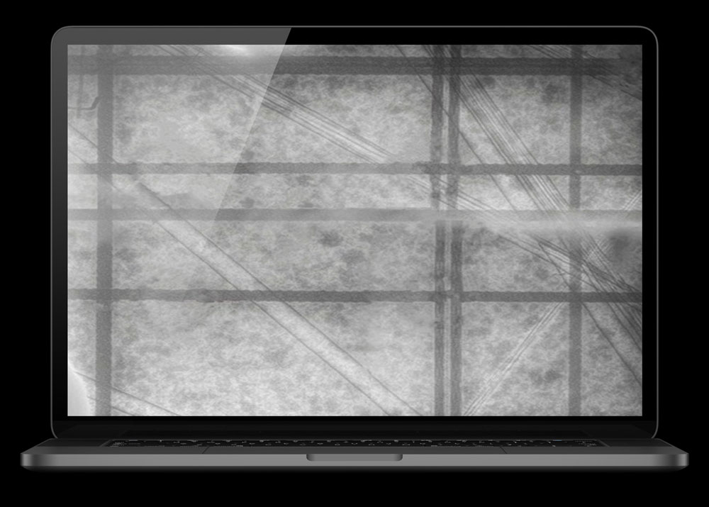 concrete site scratch with holes in a laptop